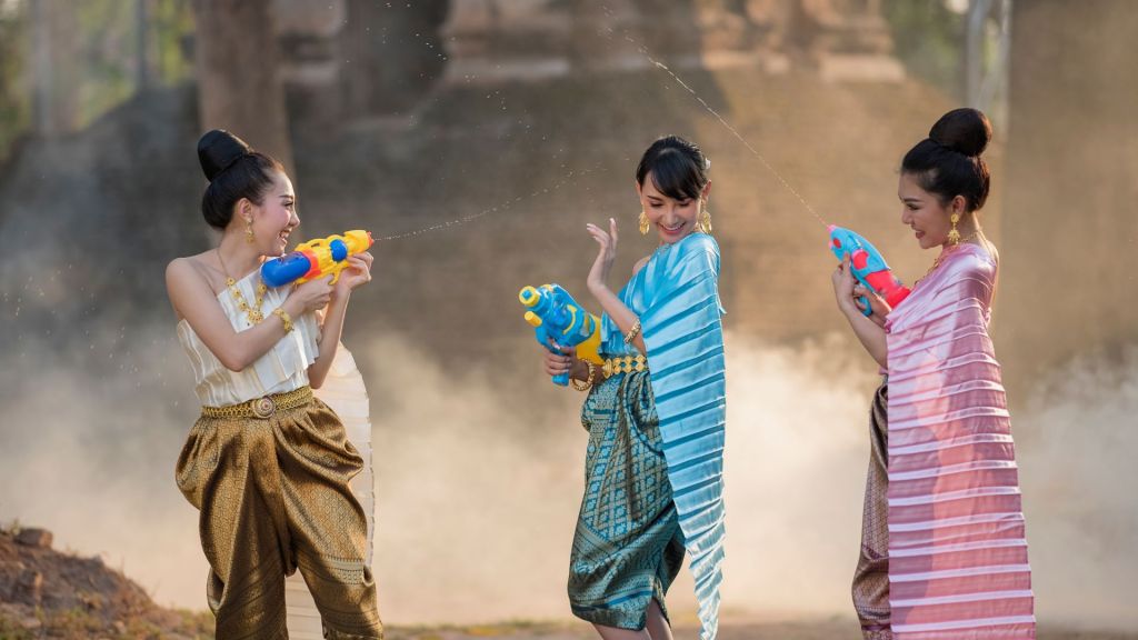 Girls playing with water during Songkran in Bangkok